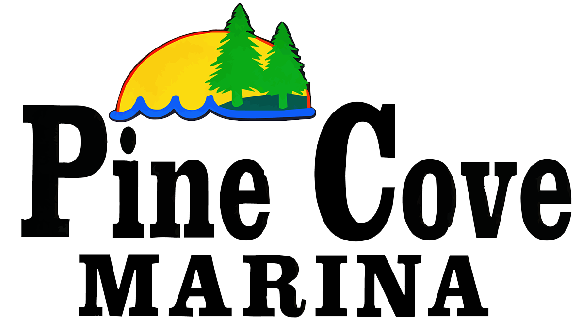 The logo of Pine Cove Marina at Lake Tenkiller features bold black text. Above Pine Cove, a sunrise rises over a wave, flanked by two pine trees, perfectly capturing the essence of Tenkiller Boat Rentals scenic beauty.